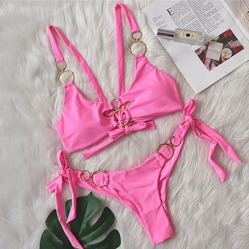 Solid Color Female Swimsuit with Metal Accents