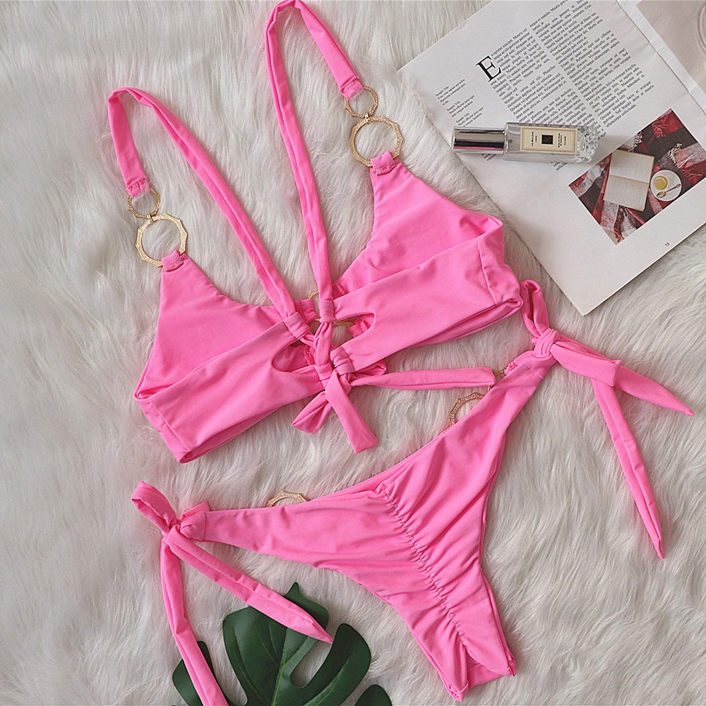 Solid Color Female Swimsuit with Metal Accents